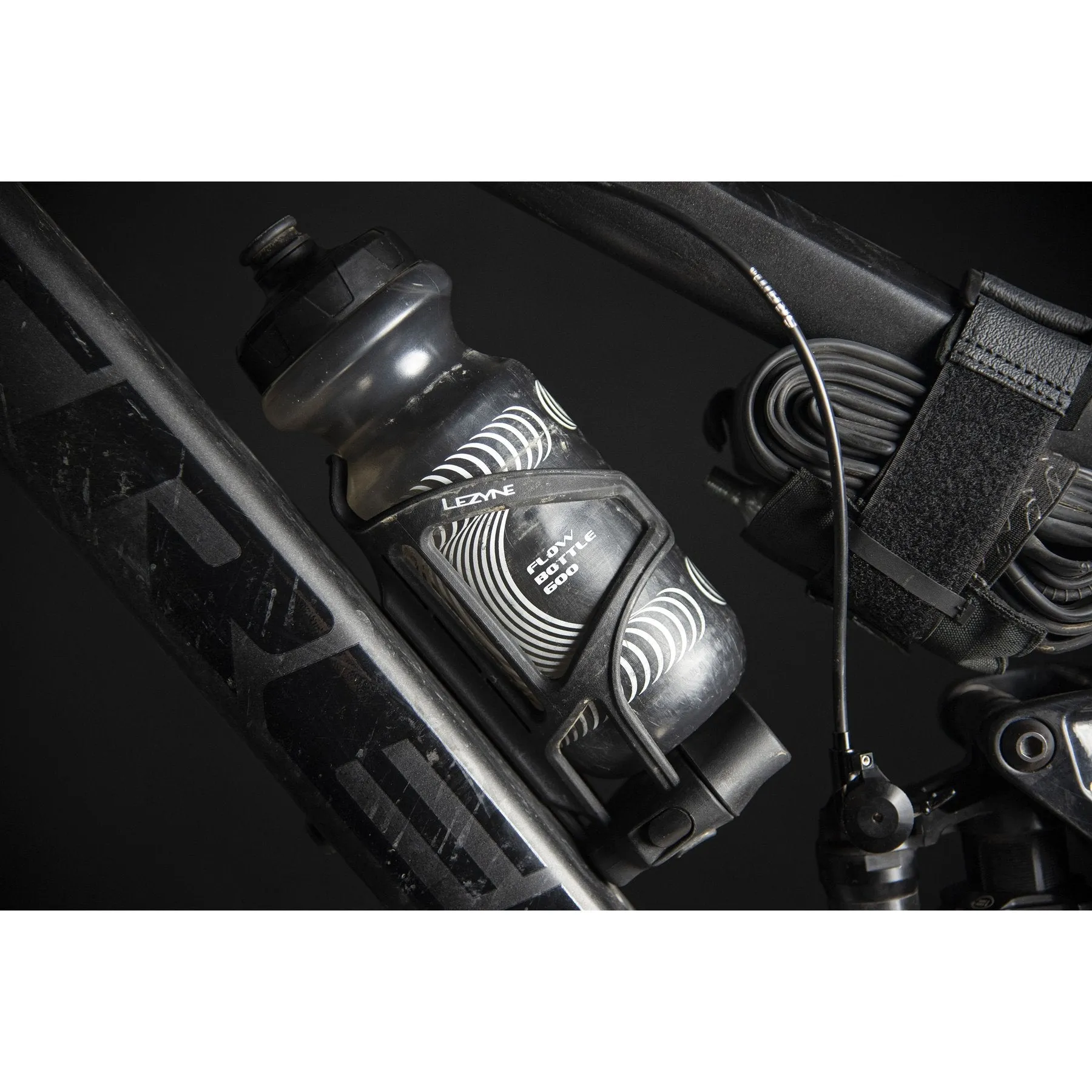 LEZYNE Tubeless Flow Storage Loaded Bicycle Cage Holder, Integrated Storage Container with V Pro Multi-Tool, Tubeless Tire Repair Tool, Tire Seals (1-BC-FLSTL-V404)